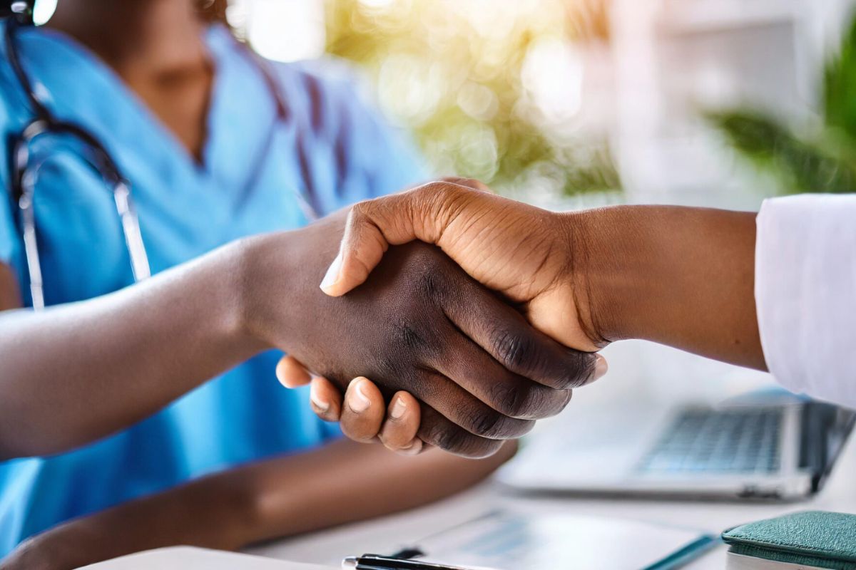 People shaking hands.